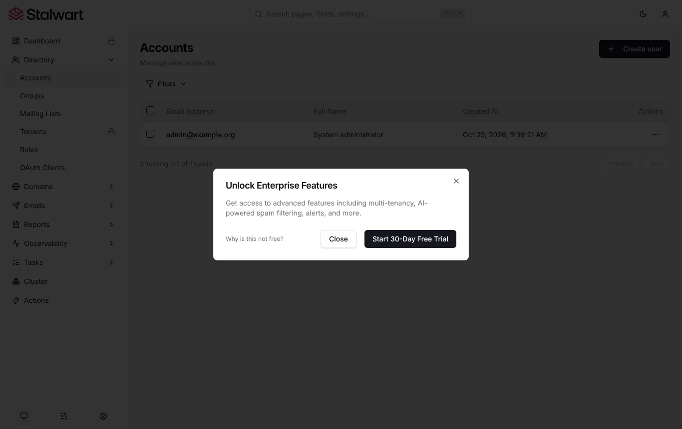 Stalwart admin screen with an Unlock Enterprise Features prompt offering a 30-day free trial; the Dashboard and Tenants menu items show padlocks.